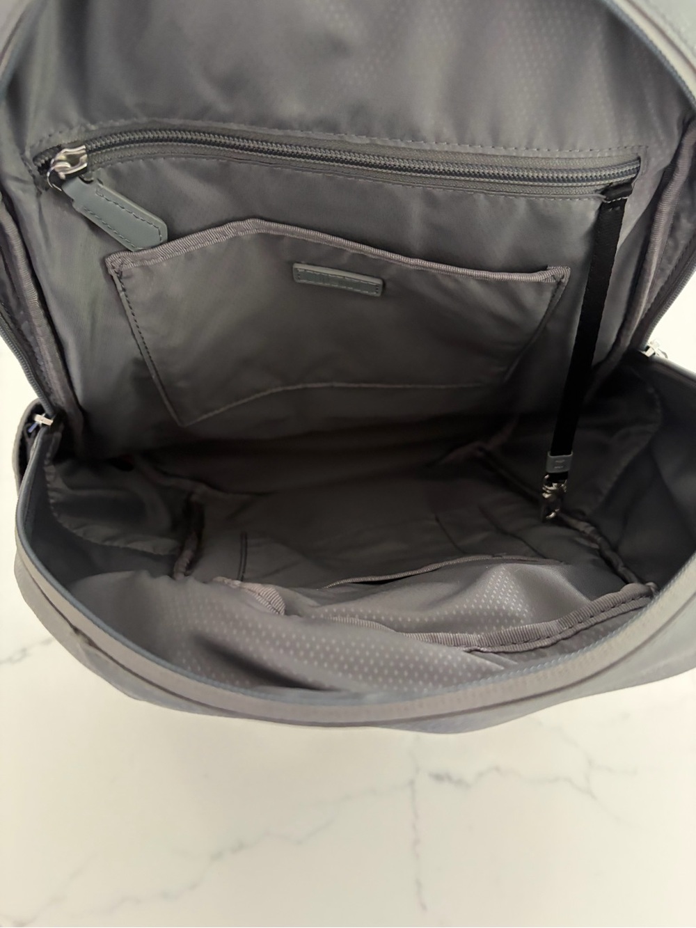 Tumi Women’s Gray Leather Studded Backpack. Large size.
NWOT. Never used it. - Picture 5 of 16
